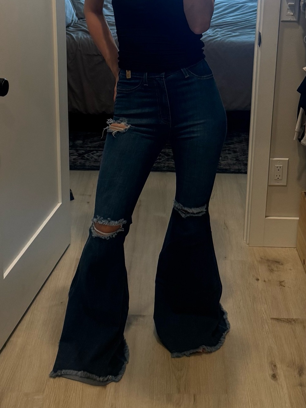 Women’s high rise flare distressed jeans